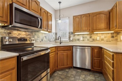 1st Floor Primary Bedroom Suite w/ Quartz & Low-Step Shower on Kiln Creek Golf and Country Club in Virginia - for sale on GolfHomes.com, golf home, golf lot