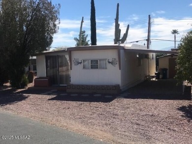 Very nice furnished north facing home with great mountain views on Tucson Estates Golf Course in Arizona - for sale on GolfHomes.com, golf home, golf lot