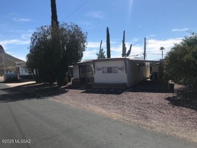 Very nice furnished north facing home with great mountain views on Tucson Estates Golf Course in Arizona - for sale on GolfHomes.com, golf home, golf lot