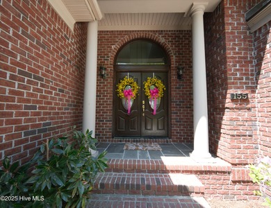 *Huge Price Reduction!* Welcome to this exceptional custom-built on Ocean Ridge Plantation in North Carolina - for sale on GolfHomes.com, golf home, golf lot