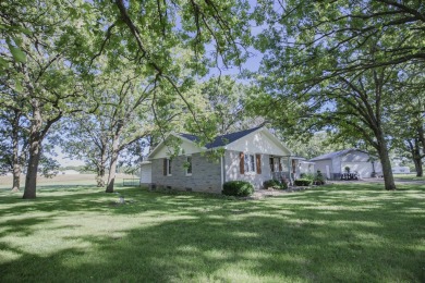 Welcome home. Located just outside of Stockton, MO, this on Stockton Country Club in Missouri - for sale on GolfHomes.com, golf home, golf lot