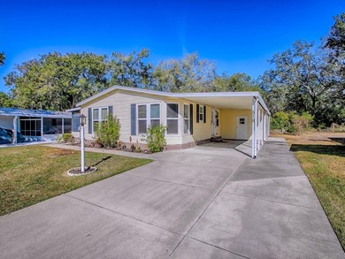 Completely remodeled manufactured home located in the desirable on El Diablo Executive Golf Course in Florida - for sale on GolfHomes.com, golf home, golf lot