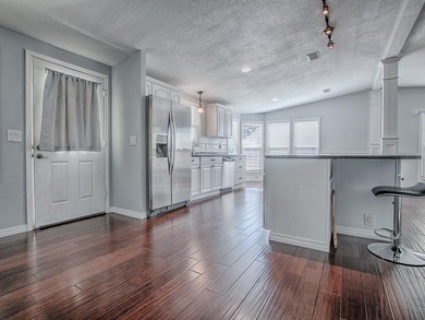 Completely remodeled manufactured home located in the desirable on El Diablo Executive Golf Course in Florida - for sale on GolfHomes.com, golf home, golf lot