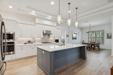 Welcome to refined Florida living in guard-gated Southern Hills on Southern Hills Plantation Club in Florida - for sale on GolfHomes.com, golf home, golf lot