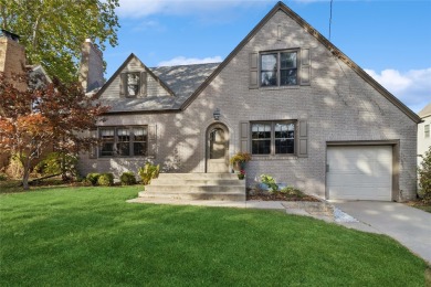 What a charmer! This darling brick 1 1/2 story home is located on Waveland Golf Course in Iowa - for sale on GolfHomes.com, golf home, golf lot