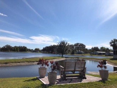 Entryway of the home has decorative frosted glass storm door on The Links of Lake Bernadette in Florida - for sale on GolfHomes.com, golf home, golf lot