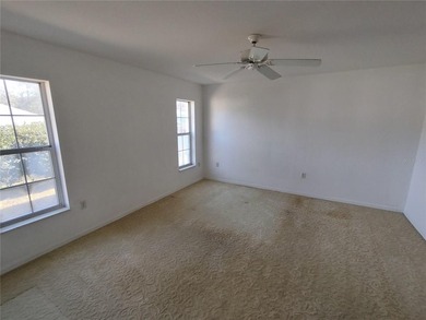 Charming Coventry model ready for new owners! This home features on Royal Oaks Golf Club in Florida - for sale on GolfHomes.com, golf home, golf lot