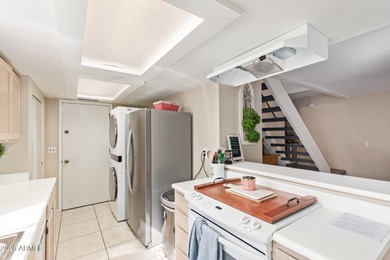 Tucked inside the desirable Pointe South Mountain Resort on Arizona Grand Resort Golf Course in Arizona - for sale on GolfHomes.com, golf home, golf lot