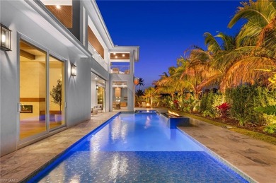 Enjoy sweeping southern exposure and serene golf course views on The Moorings Country Club in Florida - for sale on GolfHomes.com, golf home, golf lot