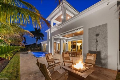 Enjoy sweeping southern exposure and serene golf course views on The Moorings Country Club in Florida - for sale on GolfHomes.com, golf home, golf lot