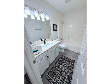 Move-in ready, furnished retreat nestled among the tall pines of on Holly Lake Ranch Golf Club in Texas - for sale on GolfHomes.com, golf home, golf lot