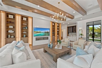 Enjoy sweeping southern exposure and serene golf course views on The Moorings Country Club in Florida - for sale on GolfHomes.com, golf home, golf lot