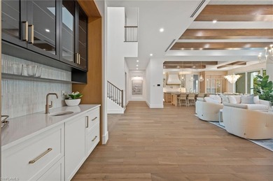 Enjoy sweeping southern exposure and serene golf course views on The Moorings Country Club in Florida - for sale on GolfHomes.com, golf home, golf lot