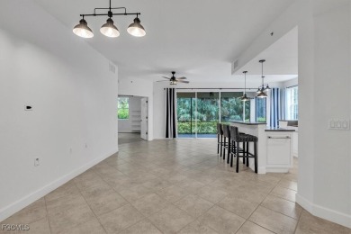 This gorgeous lower level coach home is a must-see property in on Verandah Golf Course and Club in Florida - for sale on GolfHomes.com, golf home, golf lot