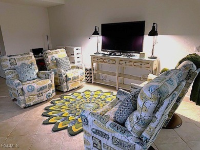 This gorgeous lower level coach home is a must-see property in on Verandah Golf Course and Club in Florida - for sale on GolfHomes.com, golf home, golf lot