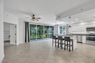 This gorgeous lower level coach home is a must-see property in on Verandah Golf Course and Club in Florida - for sale on GolfHomes.com, golf home, golf lot