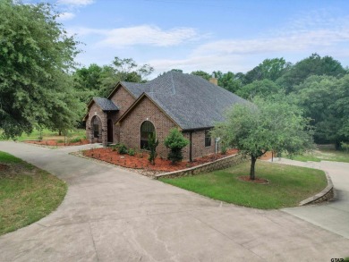 Welcome to this stunning Holly Lake Ranch dream home, complete on Holly Lake Ranch Golf Club in Texas - for sale on GolfHomes.com, golf home, golf lot
