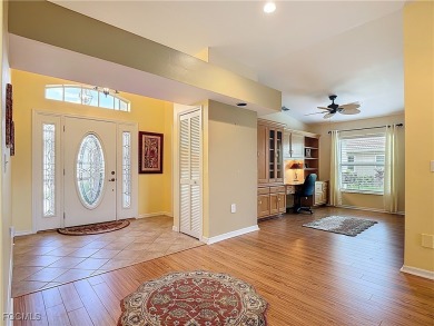 This well-maintained Villareal model home sits directly on the on Herons Glen Golf and Country Club in Florida - for sale on GolfHomes.com, golf home, golf lot