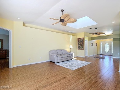 This well-maintained Villareal model home sits directly on the on Herons Glen Golf and Country Club in Florida - for sale on GolfHomes.com, golf home, golf lot