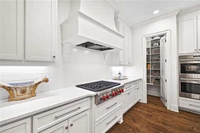 This STUNNING home nestled on the COVETED END LOT of the on North Fulton Golf Course in Georgia - for sale on GolfHomes.com, golf home, golf lot