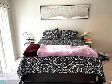 This charming 2-bedroom, 1.5-bath corner-unit townhome offers on Colony West Country Club in Florida - for sale on GolfHomes.com, golf home, golf lot