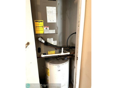 This charming 2-bedroom, 1.5-bath corner-unit townhome offers on Colony West Country Club in Florida - for sale on GolfHomes.com, golf home, golf lot