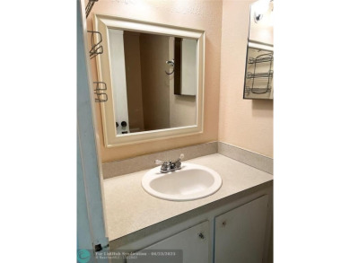 Freshly painted, this charming 2-bedroom, 1.5-bath corner-unit on Colony West Country Club in Florida - for sale on GolfHomes.com, golf home, golf lot