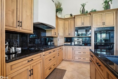 Nestled within an exclusive gated golf course community, this on Spirit Hollow Golf Course in Iowa - for sale on GolfHomes.com, golf home, golf lot