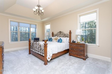 Designed for those who appreciate space with intention, this on Hasentree Club in North Carolina - for sale on GolfHomes.com, golf home, golf lot