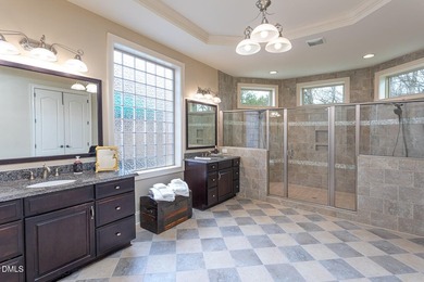 Designed for those who appreciate space with intention, this on Hasentree Club in North Carolina - for sale on GolfHomes.com, golf home, golf lot