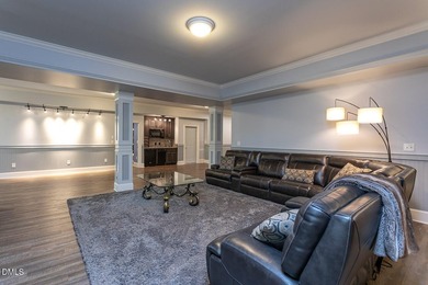 Designed for those who appreciate space with intention, this on Hasentree Club in North Carolina - for sale on GolfHomes.com, golf home, golf lot