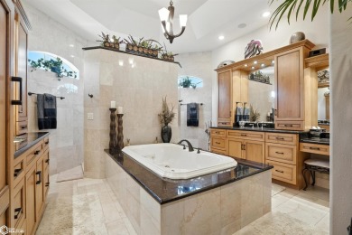 Nestled within an exclusive gated golf course community, this on Spirit Hollow Golf Course in Iowa - for sale on GolfHomes.com, golf home, golf lot