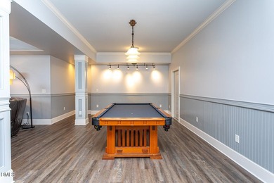 Designed for those who appreciate space with intention, this on Hasentree Club in North Carolina - for sale on GolfHomes.com, golf home, golf lot