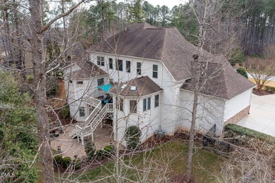 Designed for those who appreciate space with intention, this on Hasentree Club in North Carolina - for sale on GolfHomes.com, golf home, golf lot