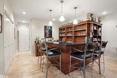 Nestled within an exclusive gated golf course community, this on Spirit Hollow Golf Course in Iowa - for sale on GolfHomes.com, golf home, golf lot