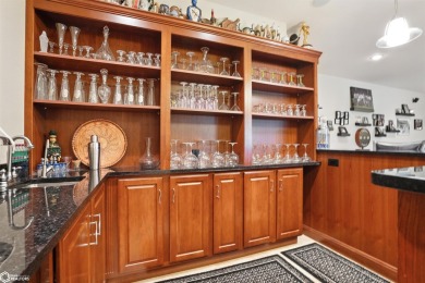 Nestled within an exclusive gated golf course community, this on Spirit Hollow Golf Course in Iowa - for sale on GolfHomes.com, golf home, golf lot