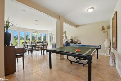 Nestled within an exclusive gated golf course community, this on Spirit Hollow Golf Course in Iowa - for sale on GolfHomes.com, golf home, golf lot