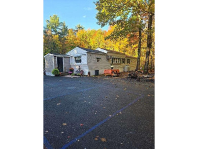 This property includes a 1971 Mobile home that has a new roof on Diadema Golf Course  in Maine - for sale on GolfHomes.com, golf home, golf lot