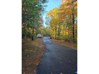 This property includes a 1971 Mobile home that has a new roof on Diadema Golf Course  in Maine - for sale on GolfHomes.com, golf home, golf lot