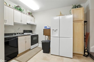 Nestled within an exclusive gated golf course community, this on Spirit Hollow Golf Course in Iowa - for sale on GolfHomes.com, golf home, golf lot