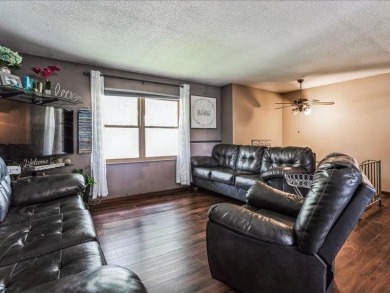 Situated on a 160' deep lot that backs up to St. Andrews Golf on St. Andrews Golf Club in Iowa - for sale on GolfHomes.com, golf home, golf lot