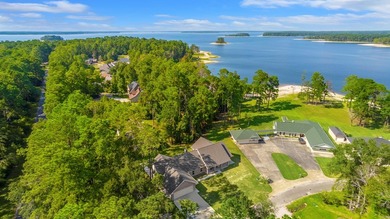 Serenity meets sophistication in this stunning waterfront on Rayburn Country Club in Texas - for sale on GolfHomes.com, golf home, golf lot