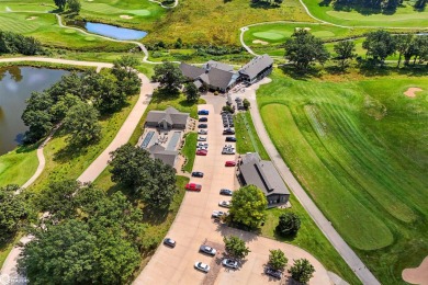 Nestled within an exclusive gated golf course community, this on Spirit Hollow Golf Course in Iowa - for sale on GolfHomes.com, golf home, golf lot