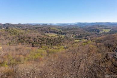 This homesite offers stunning year round mountain views and is on Old Edwards Club in North Carolina - for sale on GolfHomes.com, golf home, golf lot