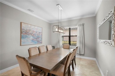 Set against tranquil lake views in highly sought-after Bonita on Bonita National Golf Course in Florida - for sale on GolfHomes.com, golf home, golf lot