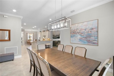 Set against tranquil lake views in highly sought-after Bonita on Bonita National Golf Course in Florida - for sale on GolfHomes.com, golf home, golf lot