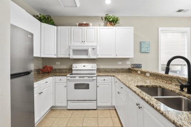 This beautifully updated first-floor 3 bedroom 2 full-bath end on World Tour Golf Links in South Carolina - for sale on GolfHomes.com, golf home, golf lot