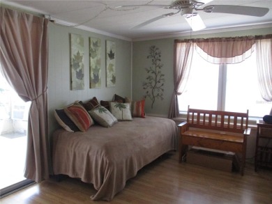 YOU'RE GONNA LOVE THIS 2 BEDROOM 2 BATH PARTIALLY FURNISHED on Heather Hills Golf Course in Florida - for sale on GolfHomes.com, golf home, golf lot