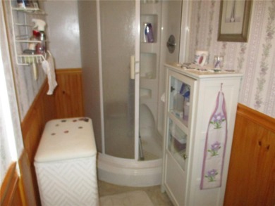 YOU'RE GONNA LOVE THIS 2 BEDROOM 2 BATH PARTIALLY FURNISHED on Heather Hills Golf Course in Florida - for sale on GolfHomes.com, golf home, golf lot