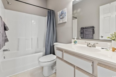 Discover the charm of this fully furnished golf condo in the on River Oaks Golf Plantation  in South Carolina - for sale on GolfHomes.com, golf home, golf lot